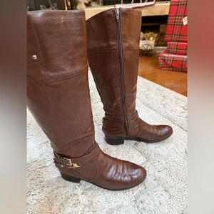 Unisa brown knee-high riding boots a style offered by the Spanish footwear brand